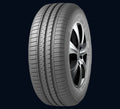 A single black tire with criss-cross grooves, designed for vehicle stability and water evacuation.