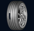 A single black tire with a tread pattern, designed for vehicle use.